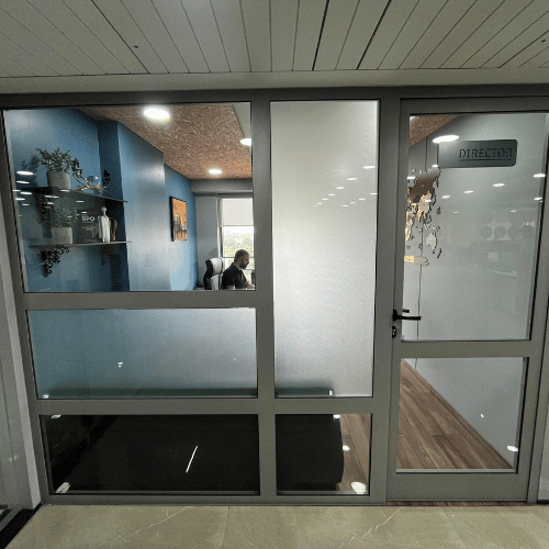 top company in ahmedabad for aluminium glass and glazing work like aluminium windows, glass doors, aluminium glass railing and structural glazing work.