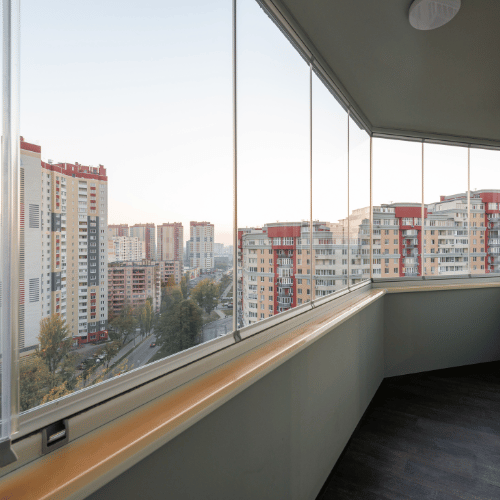 glass and aluminium balcony. window and doors installation services provider company in ahmedabad for commercial and residential properties.